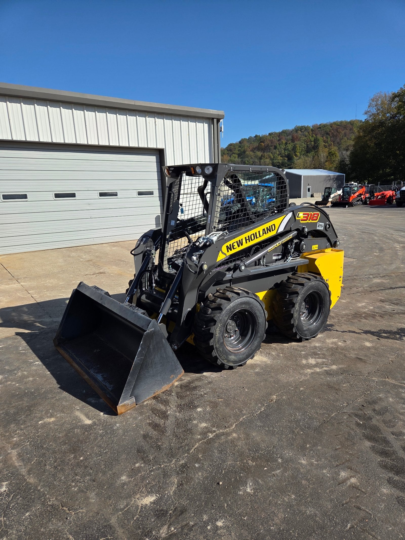 2023 New Holland L318 skid steer, used, at Brookville, IN, photo 1 of 15